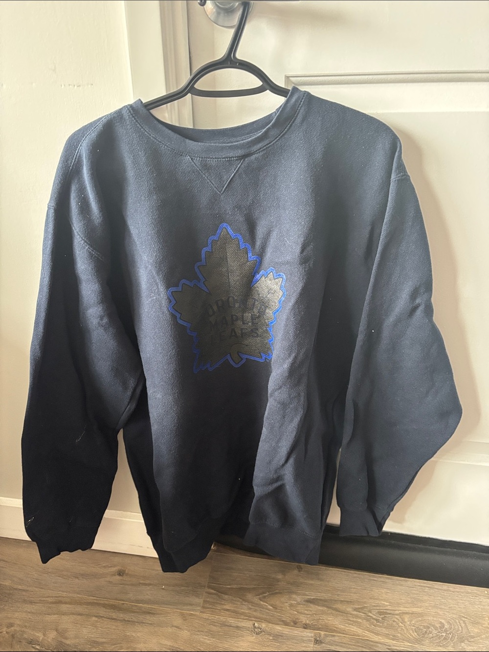 NHL Navy Crewneck Sweatshirt with Blue-Outlined Maple Leaf